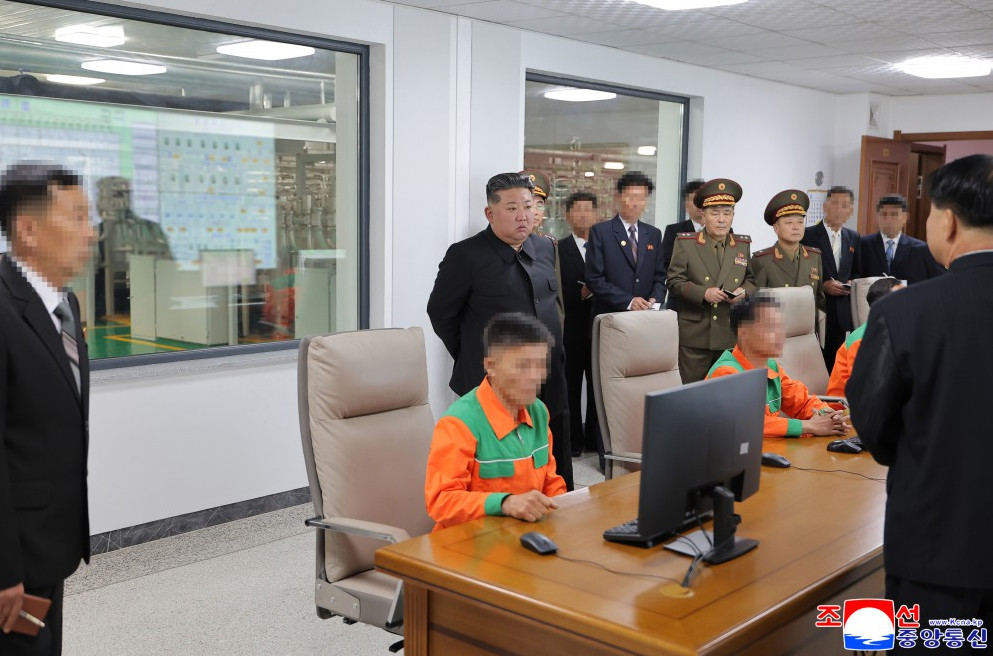 Kim jongun visits new nuclear facility kcna reports on june 4 2 | nk insider group of officials and military officers observing workers at computer desks in a control room facility inspection
